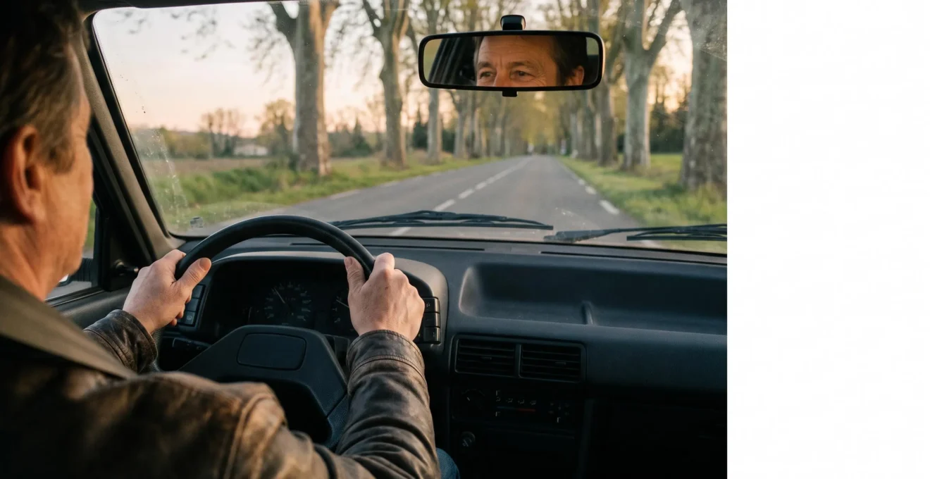 Conducteur attentif et serein tenant le volant sur une route départementale française au crépuscule, symbole de conduite responsable